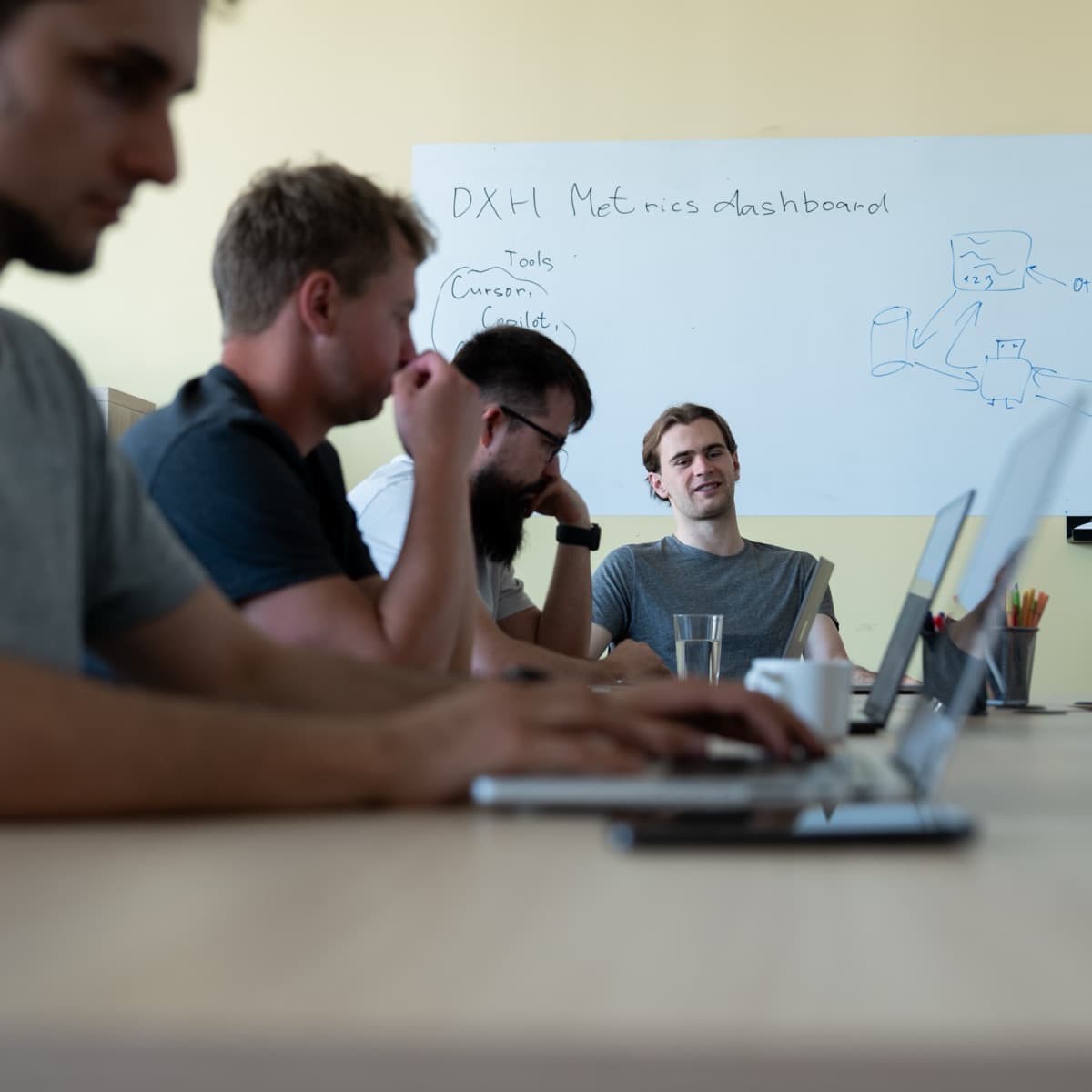 DX Heroes team collaborating on a project